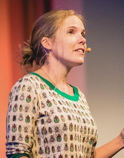 Woman named Dr Lizzy Lowe giving a lecture