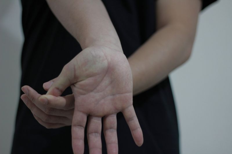 Prevent Carpal Tunnel Syndrome by gently stretching your wrist and forearm